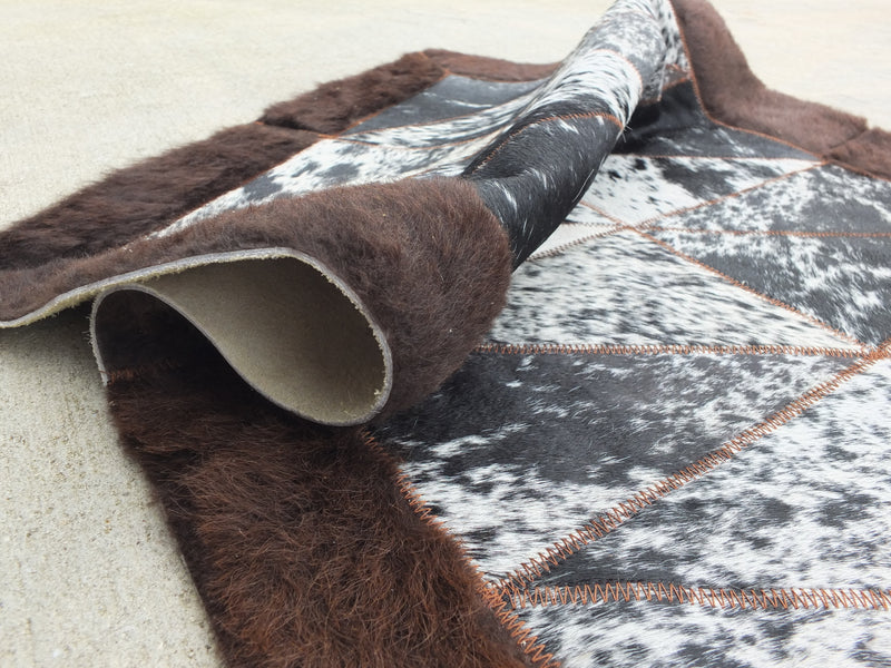 Rectangle Patchwork Rug Runner – Black & White Speckled Cowhide with Bison Leather Border (2' x 3')