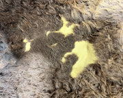 Close-up of textured material with a empty patch