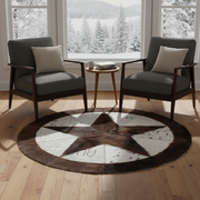Two dark gray chairs with wooden armrests in a room with large windows showing a snowy landscape.