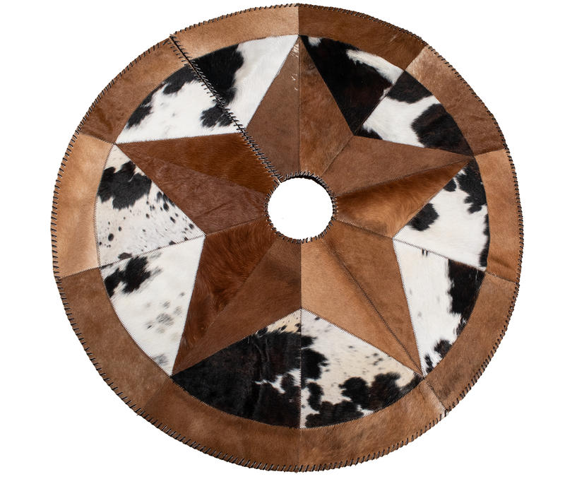 A circular cowhide Christmas tree skirt with brown and white patterns, featuring a star shape in the center and a visible zipper for attachment.